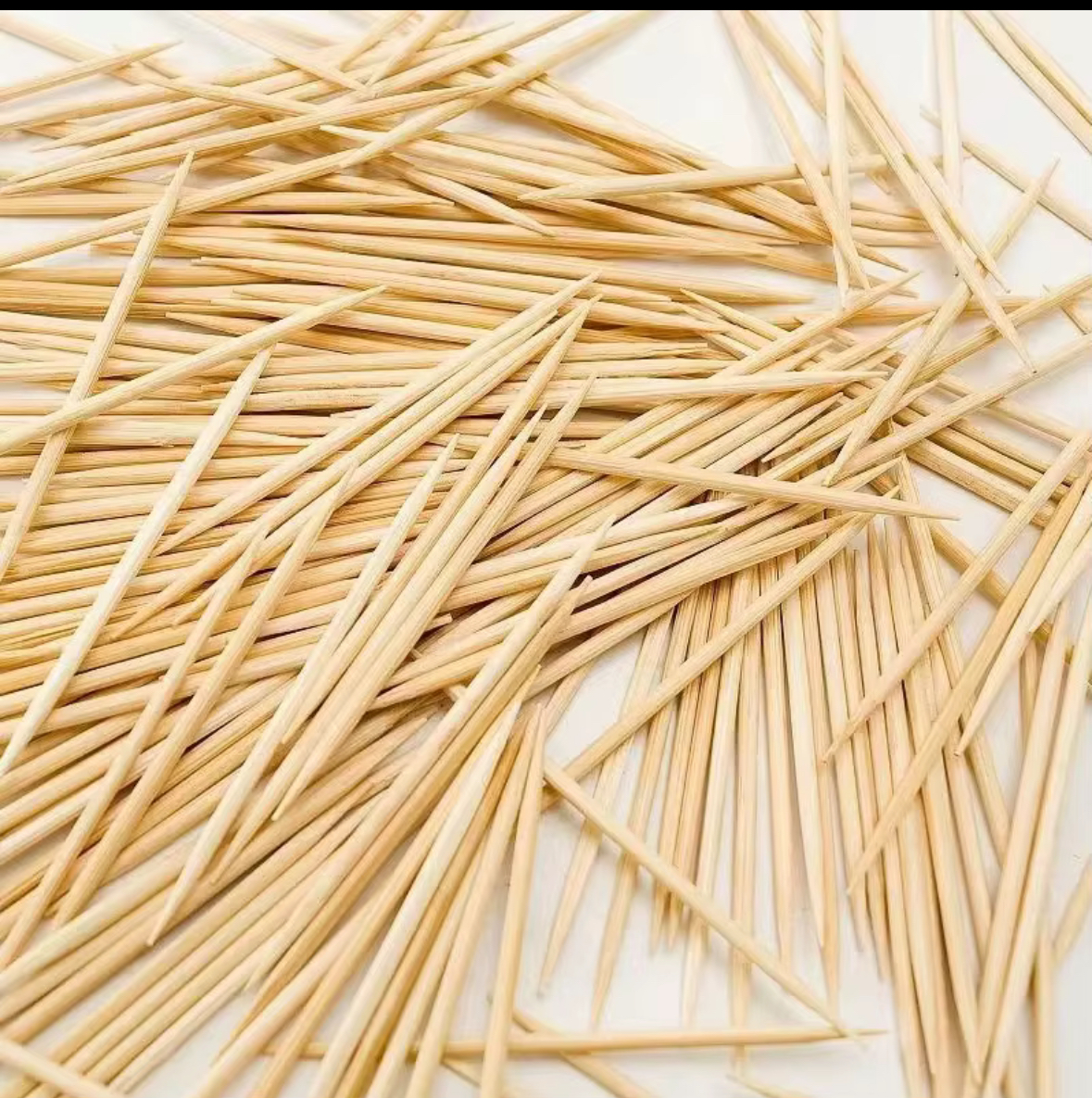 Loose natural wooden toothpicks for kitchen and catering